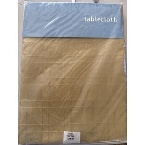 Mervyns 2002 -70 inch round tablecloth mustard plaid embossed polyester